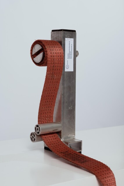 Detail van de dubbele lagers in de aluminium spanbandoproller die zorgen voor een stille en soepele draai.